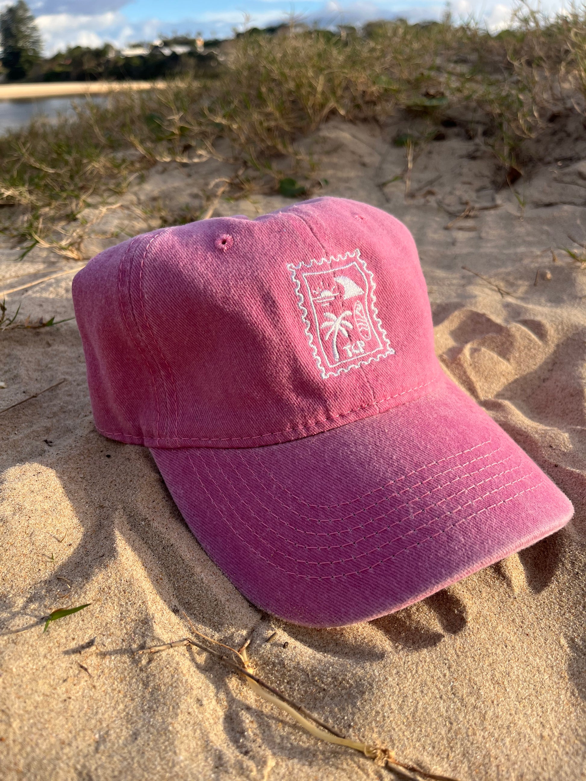 pink vintage was cap on sand