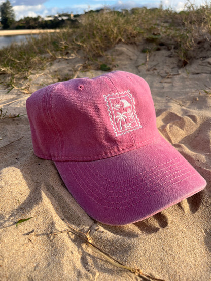 pink vintage was cap on sand