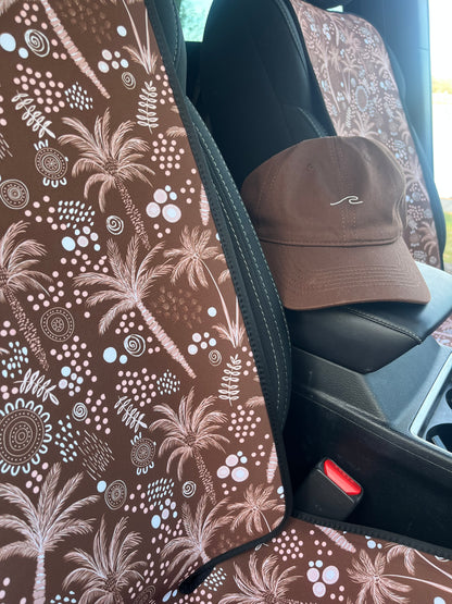 Pet car seat cover with brown palms and indigenous art