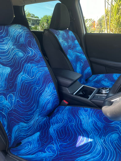 Set of bright blue ocean inspired waterproof Car Seat Covers. Made out of neoprene. Blue tie dye style print that resembles the oceans waves