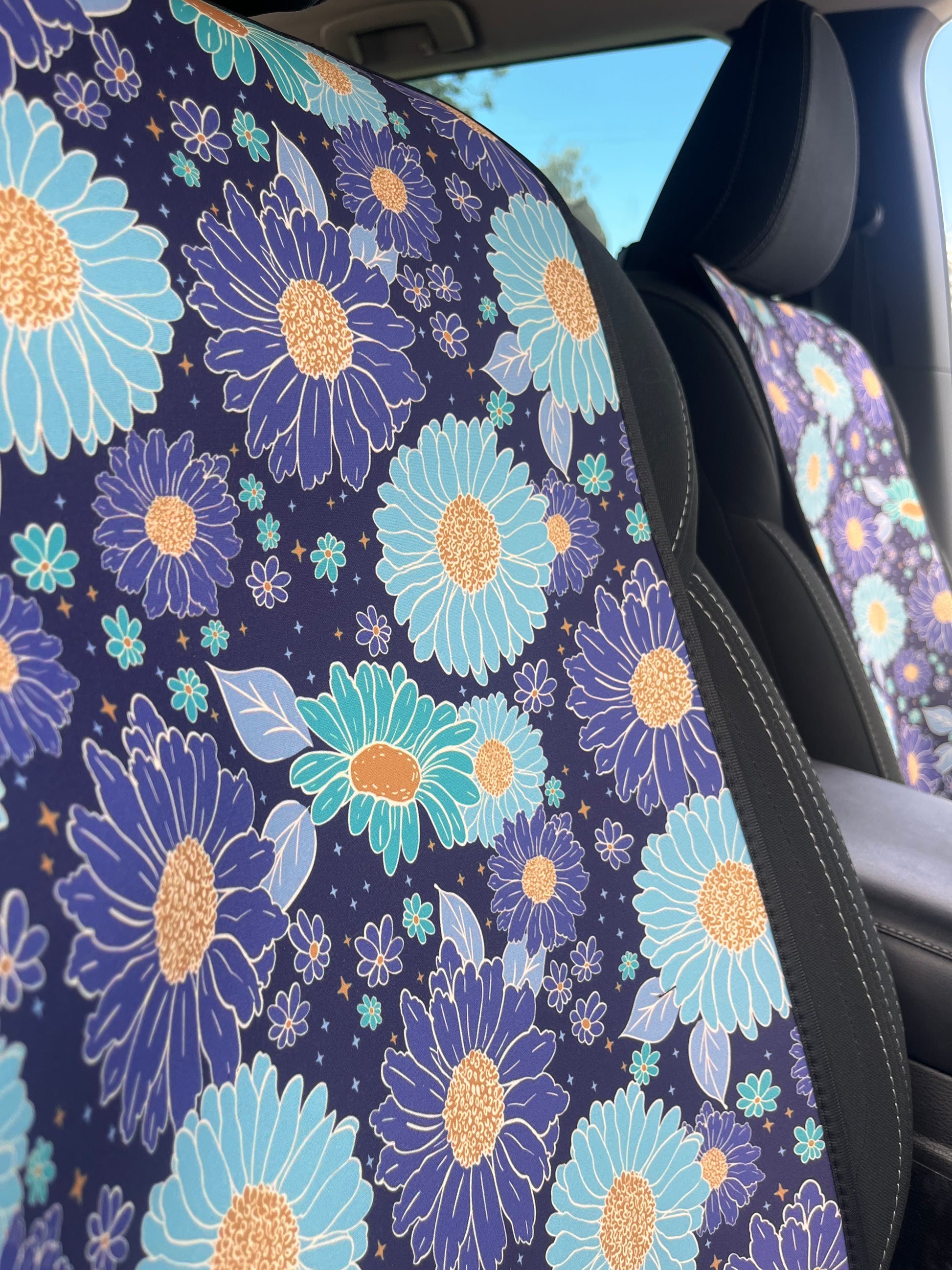 Blue and green floral print Car Seat Covers in the Car at the beach
