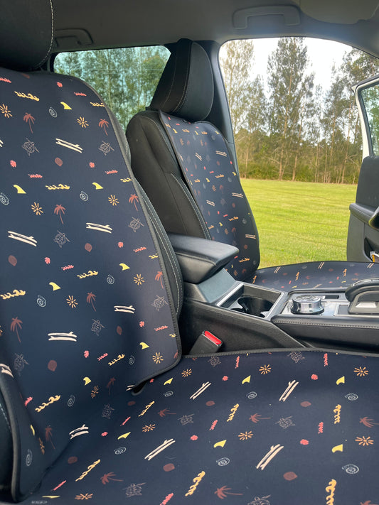 Car seat cover with a pattern on a vehicle seat