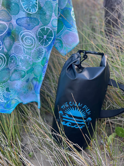 Dry bag blue print on the beach