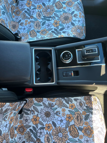Yellow, green and white floral print on neoprene Car Seat Covers. Shown on the front seats of a car. Easy to install and clean
