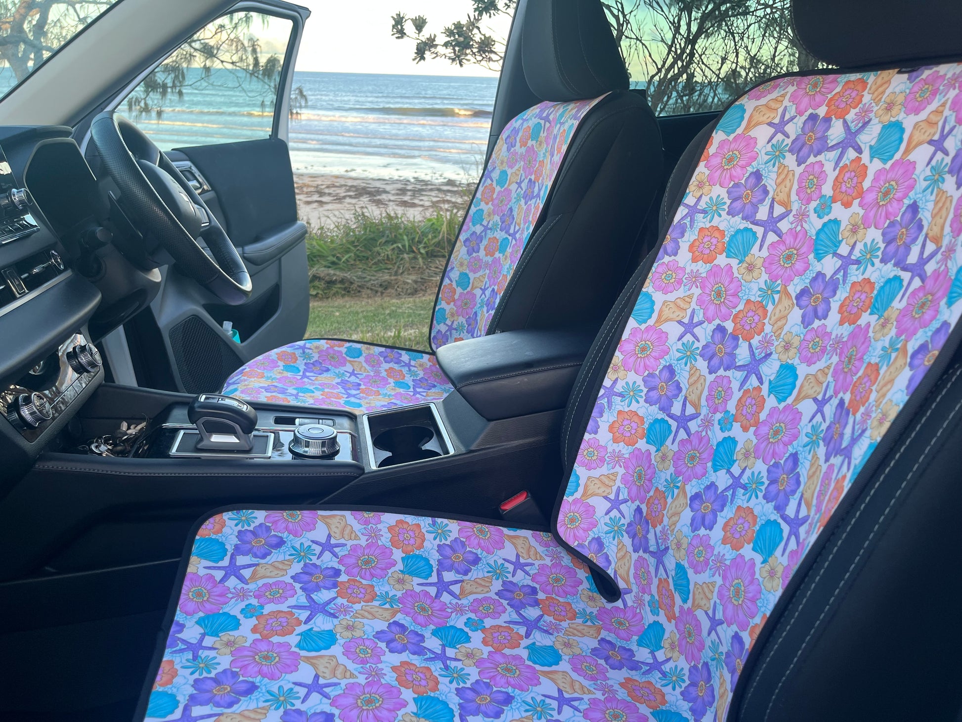 Picture of Car Seat Cover on Car Seat. Pastel flowers and Seashell print