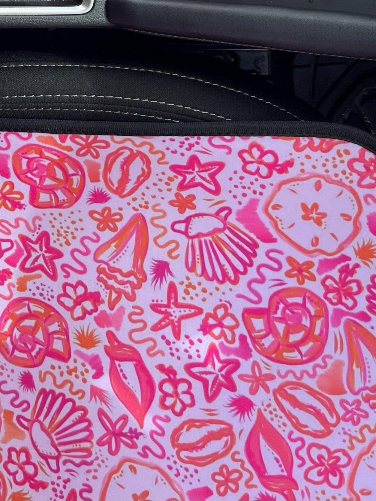 Car Seat Cover view of the bottom of the car seat. With Pink Seashells