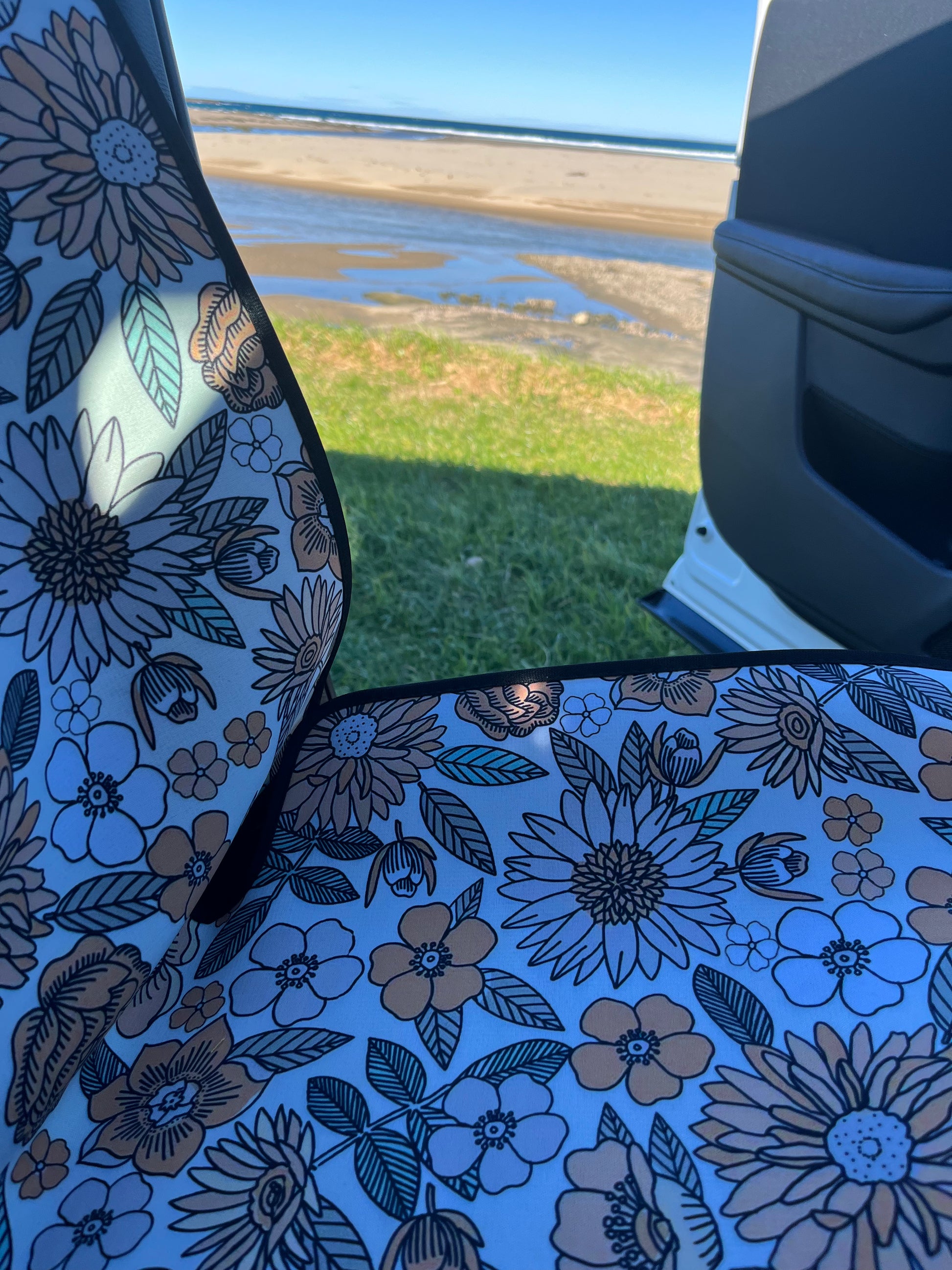 Yellow, green and white floral print on neoprene Car Seat Covers. Shown on the front seats of a car. Easy to install and clean