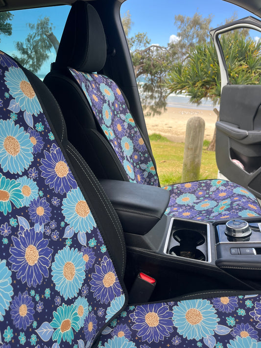 Blue and green floral print Car Seat Covers in the Car at the beach